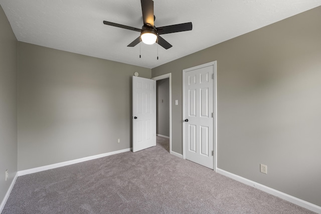 1109 Seville Ct, Lexington, KY 40515 - unfurnished bedroom with carpet floors, baseboards, ceiling fan, and a closet