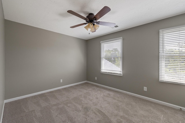 1109 Seville Ct, Lexington, KY 40515 - unfurnished room with light carpet, a ceiling fan, and baseboards