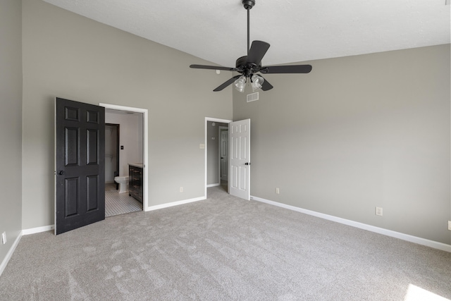 1109 Seville Ct, Lexington, KY 40515 - unfurnished bedroom with high vaulted ceiling, carpet floors, baseboards, connected bathroom, and a ceiling fan