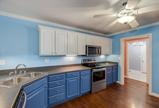 3373 Malone Dr, Lexington, KY 40513 - kitchen featuring appliances with stainless steel finishes, blue cabinets, a sink, white cabinets, and ceiling fan
