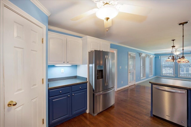 3373 Malone Dr, Lexington, KY 40513 - kitchen with appliances with stainless steel finishes, white cabinetry, dark wood finished floors, crown molding, and hanging light fixtures
