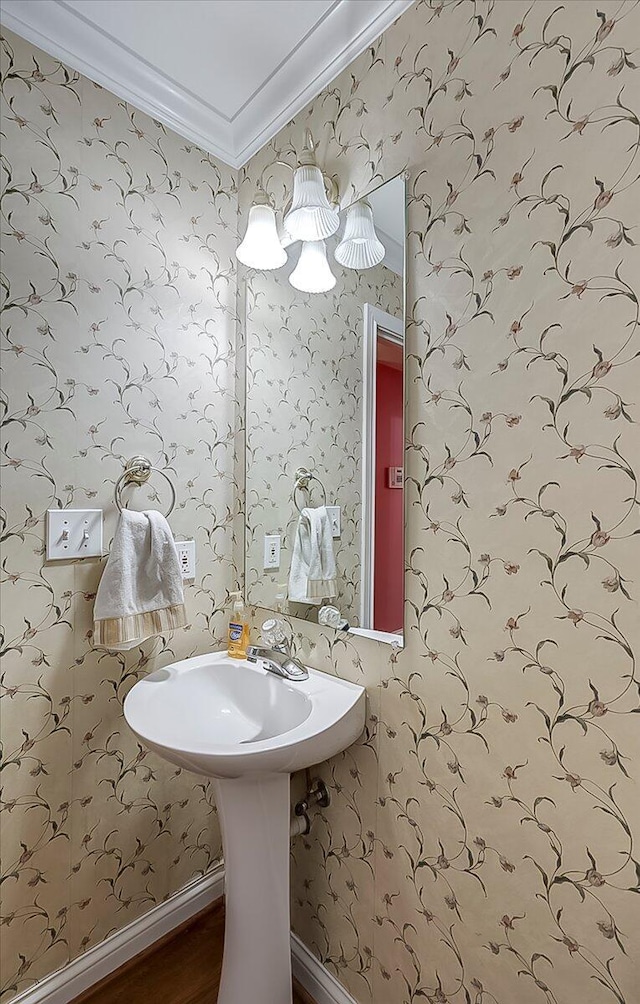 3373 Malone Dr, Lexington, KY 40513 - bathroom with ornamental molding, wallpapered walls, wood finished floors, and baseboards