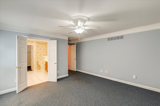 3373 Malone Dr, Lexington, KY 40513 - unfurnished bedroom with crown molding, dark colored carpet, baseboards, ceiling fan, and ensuite bath