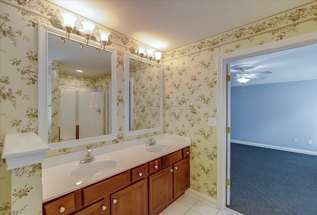 3373 Malone Dr, Lexington, KY 40513 - bathroom featuring double vanity, a shower stall, tile patterned flooring, and a ceiling fan