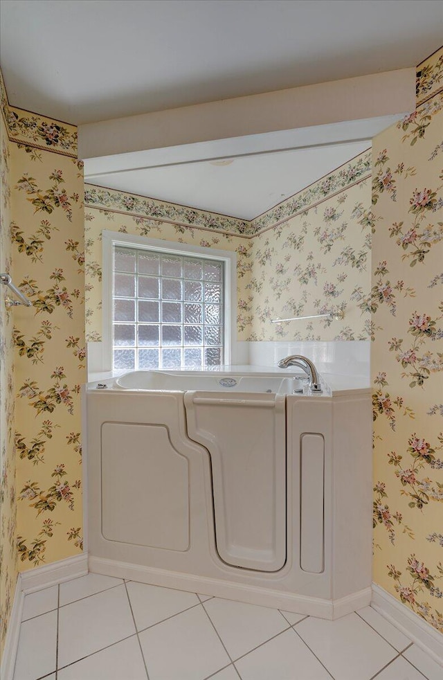 3373 Malone Dr, Lexington, KY 40513 - bathroom with tile patterned floors, a bath, baseboards, and wallpapered walls
