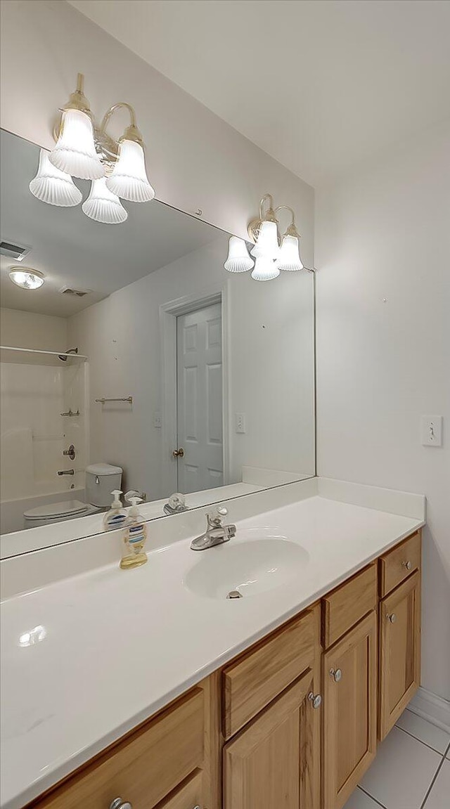 3373 Malone Dr, Lexington, KY 40513 - bathroom with toilet, vanity, tile patterned flooring, and shower / tub combination