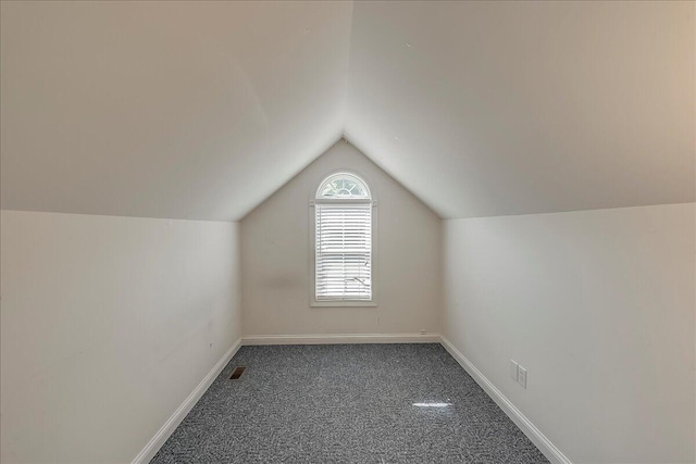 3373 Malone Dr, Lexington, KY 40513 - additional living space with carpet floors, lofted ceiling, and baseboards