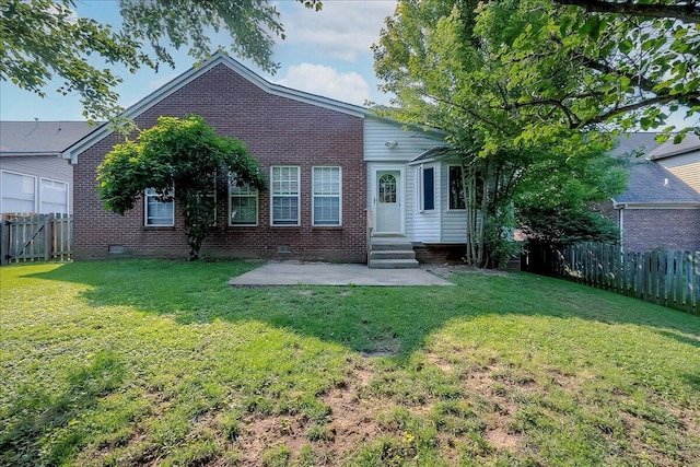 3373 Malone Dr, Lexington, KY 40513 - view of front facade with a patio area, entry steps, brick siding, and crawl space