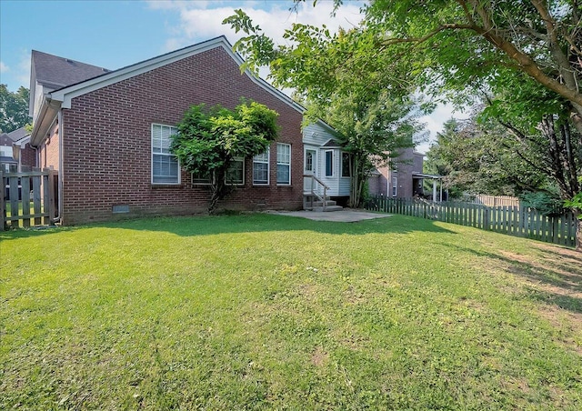 3373 Malone Dr, Lexington, KY 40513 - view of front facade featuring entry steps, brick siding, crawl space, and a patio