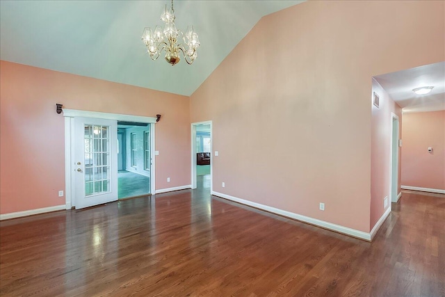 3373 Malone Dr, Lexington, KY 40513 - spare room with a chandelier, wood finished floors, baseboards, and high vaulted ceiling