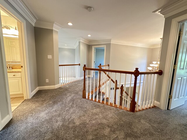 3217 Malone Dr, Lexington, KY 40513 - corridor with carpet floors, crown molding, a chandelier, an upstairs landing, and baseboards