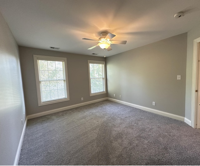3217 Malone Dr, Lexington, KY 40513 - empty room featuring carpet, a ceiling fan, and baseboards
