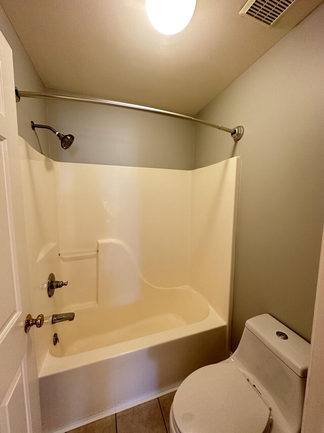 3217 Malone Dr, Lexington, KY 40513 - bathroom with toilet, shower / washtub combination, and tile patterned floors