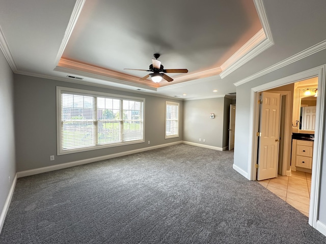 3217 Malone Dr, Lexington, KY 40513 - unfurnished bedroom with a raised ceiling, light carpet, ornamental molding, baseboards, and ceiling fan