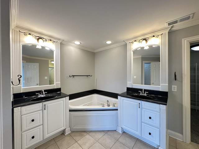 3217 Malone Dr, Lexington, KY 40513 - bathroom with tile patterned floors, two vanities, a garden tub, ornamental molding, and recessed lighting
