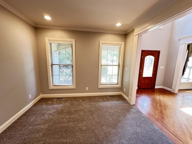 3217 Malone Dr, Lexington, KY 40513 - carpeted foyer entrance with healthy amount of natural light, ornamental molding, baseboards, and recessed lighting