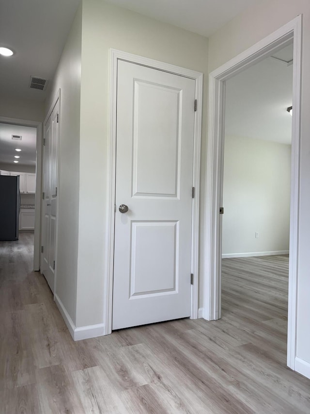 277 Broadway St A-B, Unit A-B Irvine, KY 40336 - hallway featuring light wood-style floors
