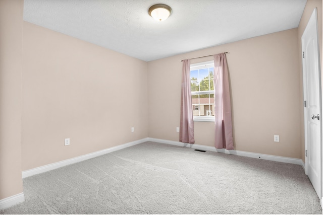 15 April Ln, Corbin, KY 40701 - carpeted empty room featuring baseboards and a textured ceiling
