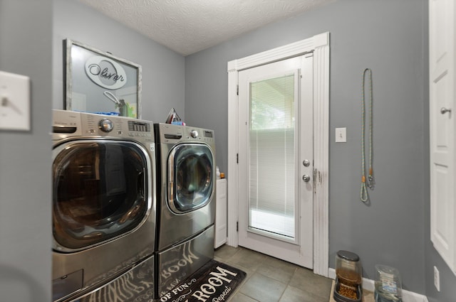 2003 Cresent Cir, Corbin, KY 40701 - laundry area with separate washer and dryer, tile patterned flooring, and a textured ceiling