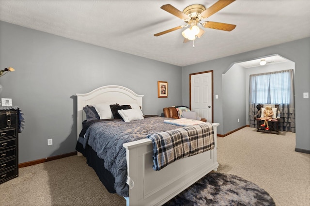 2003 Cresent Cir, Corbin, KY 40701 - bedroom with carpet flooring, baseboards, a ceiling fan, and arched walkways