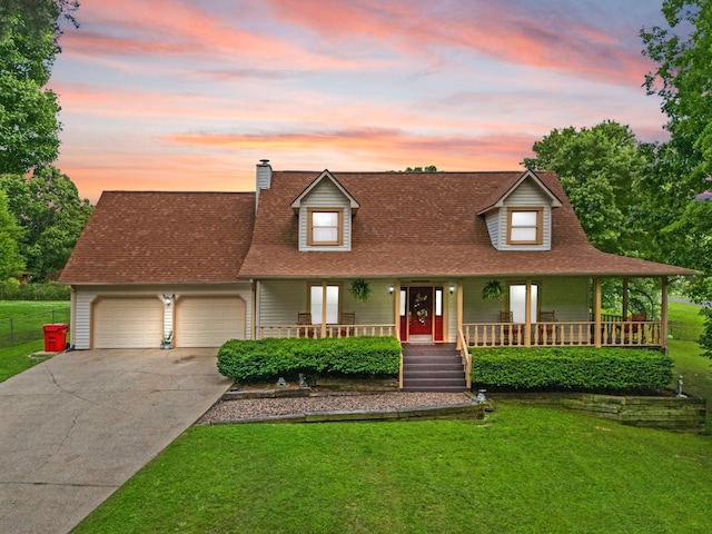 2003 Cresent Cir, Corbin, KY 40701 - view of front of home featuring a porch, a garage, concrete driveway, a chimney, and roof with shingles