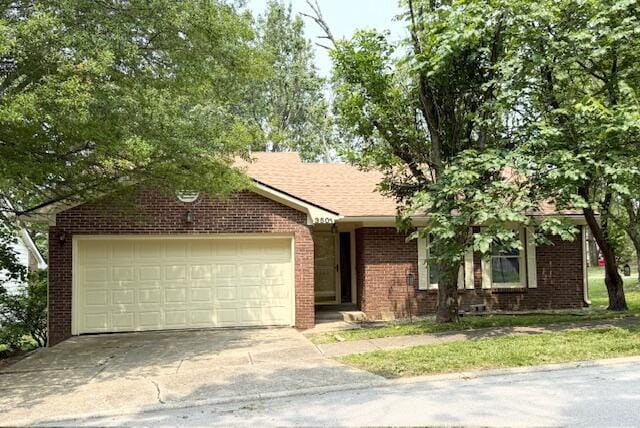 3501 Marsanne Ct, Lexington, KY 40515 - view of front of house featuring concrete driveway, brick siding, and an attached garage