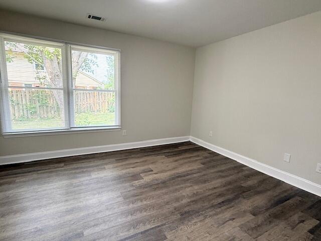 3501 Marsanne Ct, Lexington, KY 40515 - spare room featuring dark wood-style flooring and baseboards