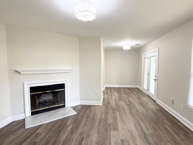 3501 Marsanne Ct, Lexington, KY 40515 - unfurnished living room with wood finished floors, baseboards, and a glass covered fireplace