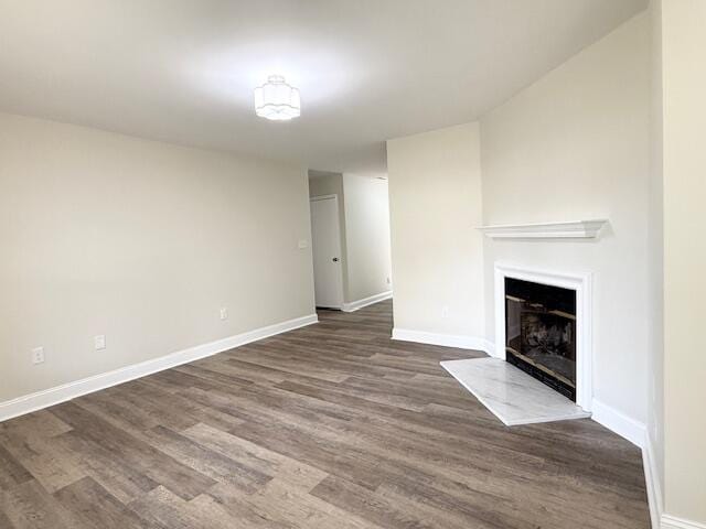 3501 Marsanne Ct, Lexington, KY 40515 - unfurnished living room featuring dark wood-style floors, baseboards, and a fireplace with raised hearth