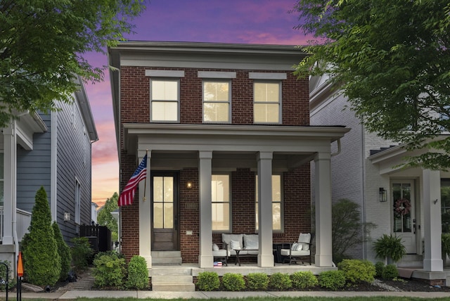 10910 Kings Crown Dr, Prospect, KY 40059 - view of front of home featuring brick siding, an outdoor living space, and covered porch