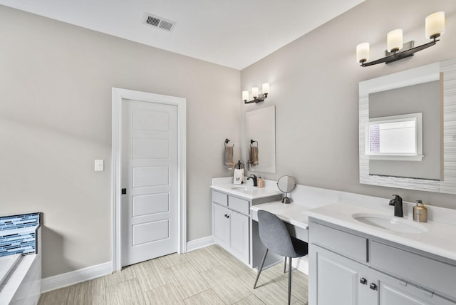 10910 Kings Crown Dr, Prospect, KY 40059 - bathroom with double vanity, baseboards, and tiled bath