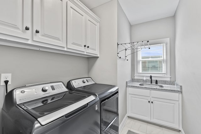 10910 Kings Crown Dr, Prospect, KY 40059 - laundry room featuring washing machine and clothes dryer, light marble finish flooring, cabinet space, and baseboards