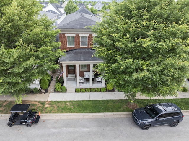 10910 Kings Crown Dr, Prospect, KY 40059 - view of front of home featuring brick siding, a shingled roof, and a porch