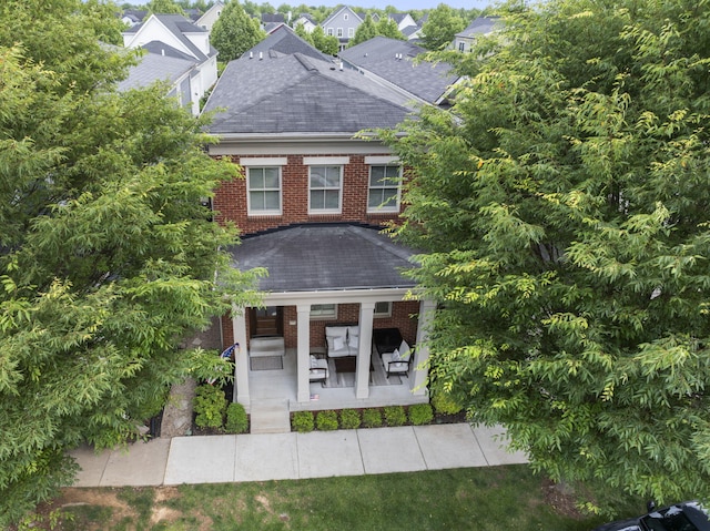 10910 Kings Crown Dr, Prospect, KY 40059 - back of property with roof with shingles, brick siding, and a patio area