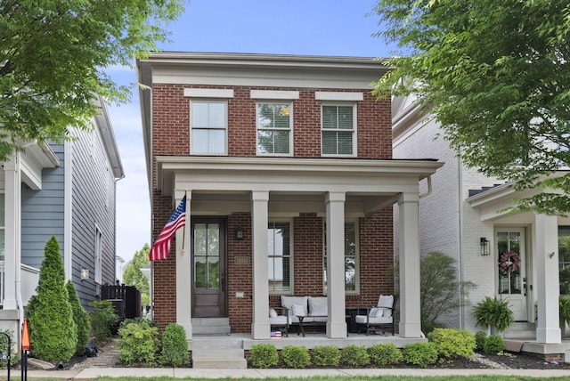 10910 Kings Crown Dr, Prospect, KY 40059 - view of front of house with brick siding, an outdoor hangout area, and a porch