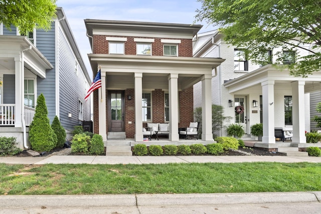 10910 Kings Crown Dr, Prospect, KY 40059 - american foursquare style home with a porch, brick siding, and outdoor lounge area