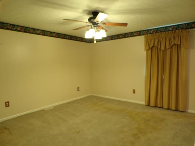 706 Allf Ln, London, KY 40741 - unfurnished room featuring ceiling fan, carpet flooring, and baseboards