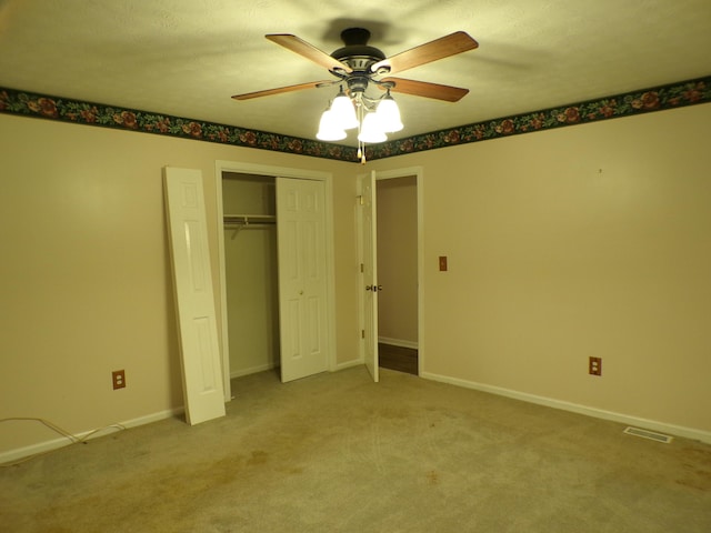 706 Allf Ln, London, KY 40741 - unfurnished bedroom with a closet, carpet flooring, a ceiling fan, and baseboards