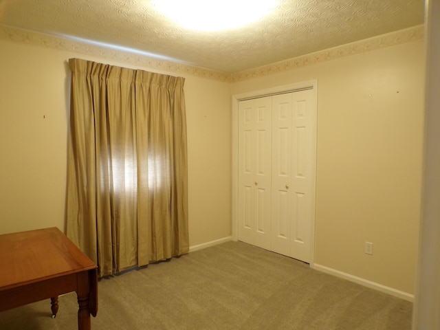 706 Allf Ln, London, KY 40741 - unfurnished bedroom featuring light carpet, a closet, a textured ceiling, and baseboards
