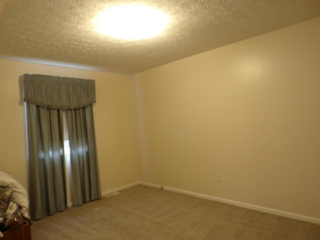 706 Allf Ln, London, KY 40741 - empty room with light carpet, a textured ceiling, and baseboards