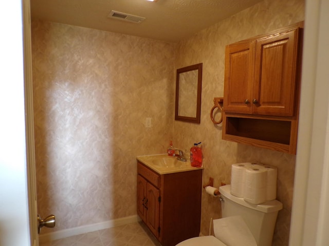 706 Allf Ln, London, KY 40741 - bathroom featuring vanity, toilet, and baseboards