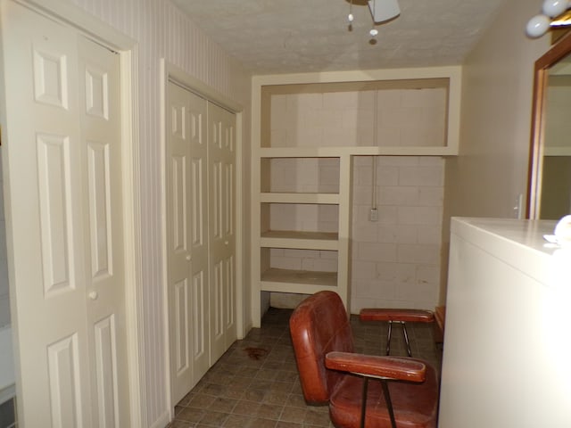 706 Allf Ln, London, KY 40741 - laundry room with washer / dryer, a fireplace, and dark tile patterned flooring