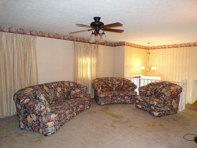 706 Allf Ln, London, KY 40741 - carpeted living area with a ceiling fan and a chandelier
