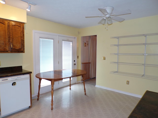 706 Allf Ln, London, KY 40741 - dining area featuring a ceiling fan, light floors, and baseboards