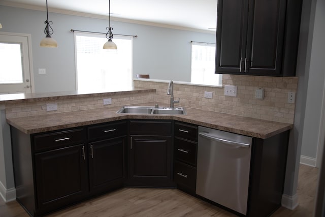 4745 Willman Way, Lexington, KY 40509 - kitchen featuring stainless steel dishwasher, a sink, tasteful backsplash, light wood-style floors, and crown molding