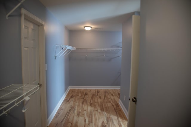 4745 Willman Way, Lexington, KY 40509 - spacious closet featuring light wood finished floors