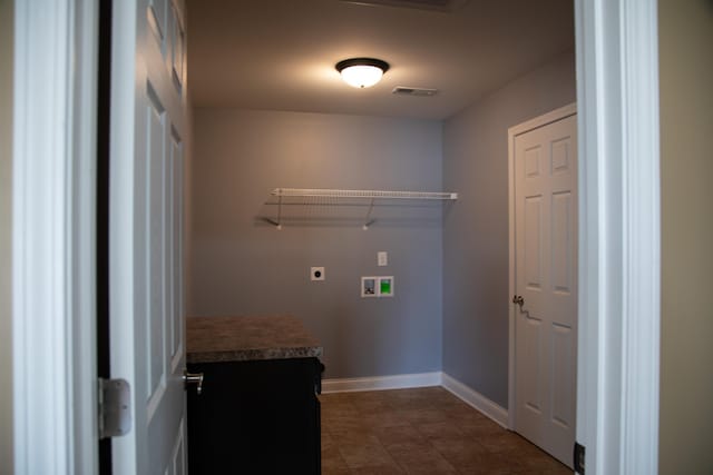 4745 Willman Way, Lexington, KY 40509 - laundry room featuring hookup for an electric dryer, baseboards, washer hookup, and dark tile patterned flooring
