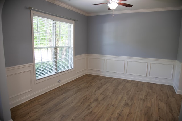 4745 Willman Way, Lexington, KY 40509 - spare room featuring ceiling fan, a wainscoted wall, ornamental molding, wood finished floors, and a decorative wall