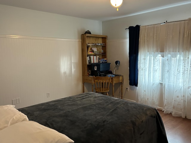 1125 Turkey Foot Rd Unit 3, Lexington, KY 40502 - bedroom with wainscoting and wood finished floors