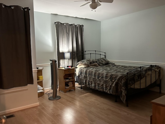 1125 Turkey Foot Rd Unit 3, Lexington, KY 40502 - bedroom featuring wood finished floors, a ceiling fan, and baseboards